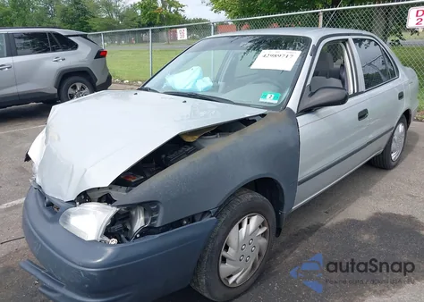 1999 Toyota Corolla Ce z USA, uszkodzony, nr VIN 2T1BR12E9XC180124